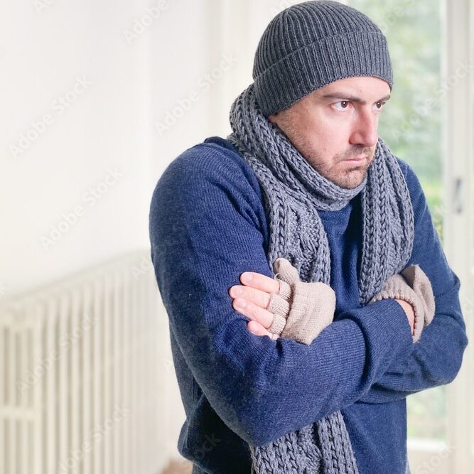 Cold man in need of Bart's HVAC Heating Service DFW